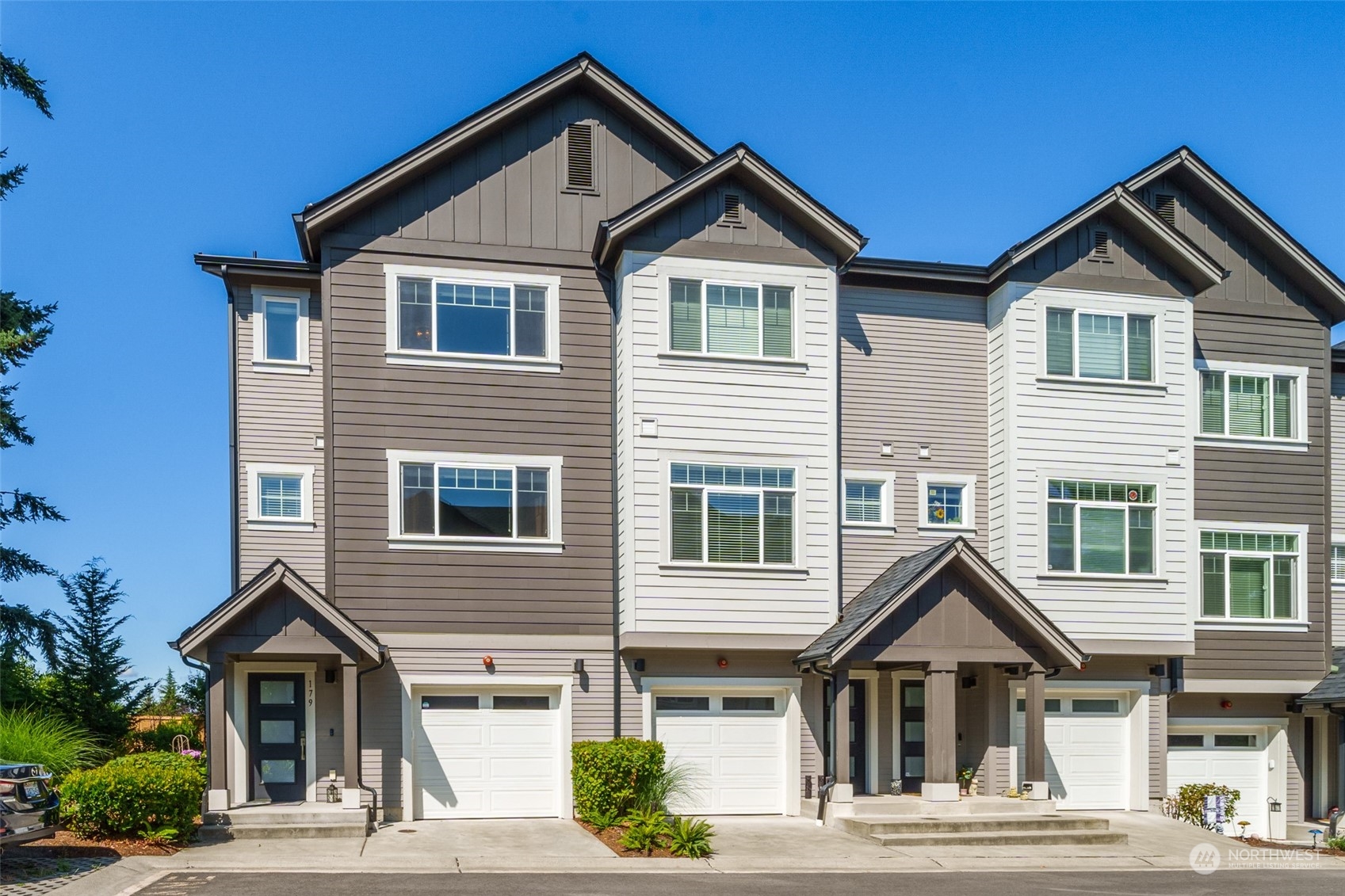 179 Southwest 185th Lane Normandy Park, WA 98166 - Photo 1 of 1 a front view of a house with a yard
