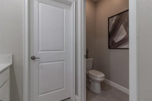 a stove top oven sitting inside of a kitchen