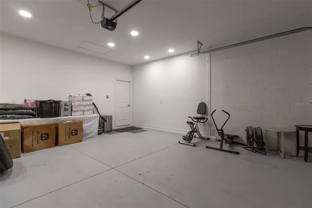 a view of a garden with a building in the background