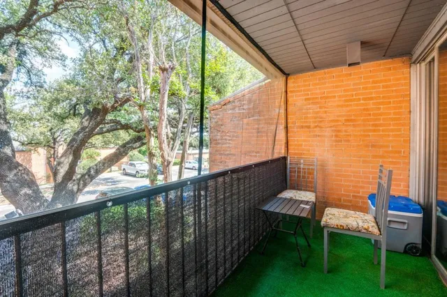 a view of a two chairs in the roof deck
