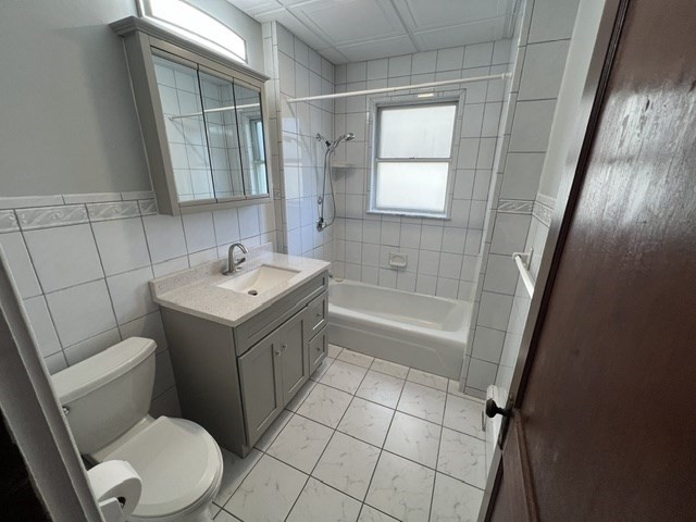 0 Lafayette Street, Unit 1 Fall River, MA 02723 - Photo 4 of 13 a bathroom with a sink a toilet and shower