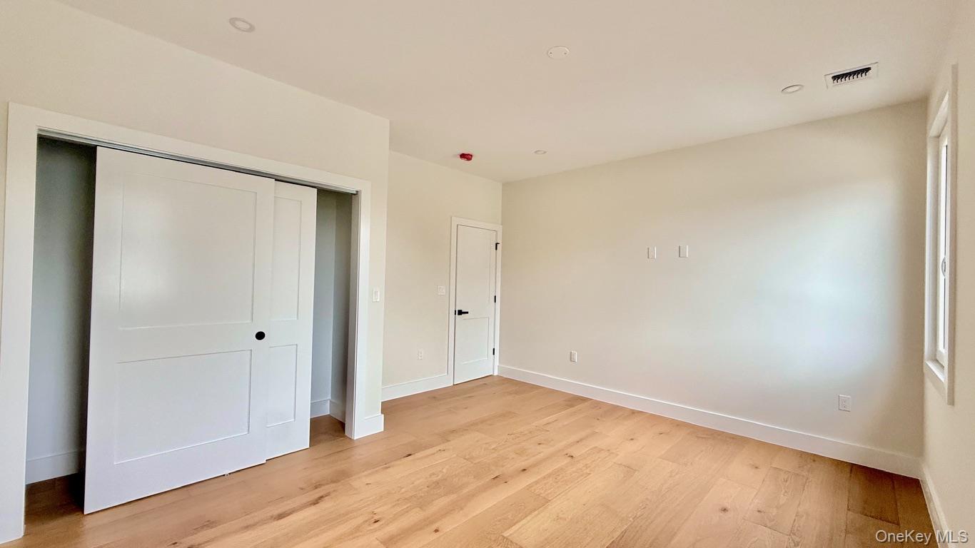 60 Periwinkle Road Levittown, NY 11756 - Photo 30 of 33 a view of an empty room