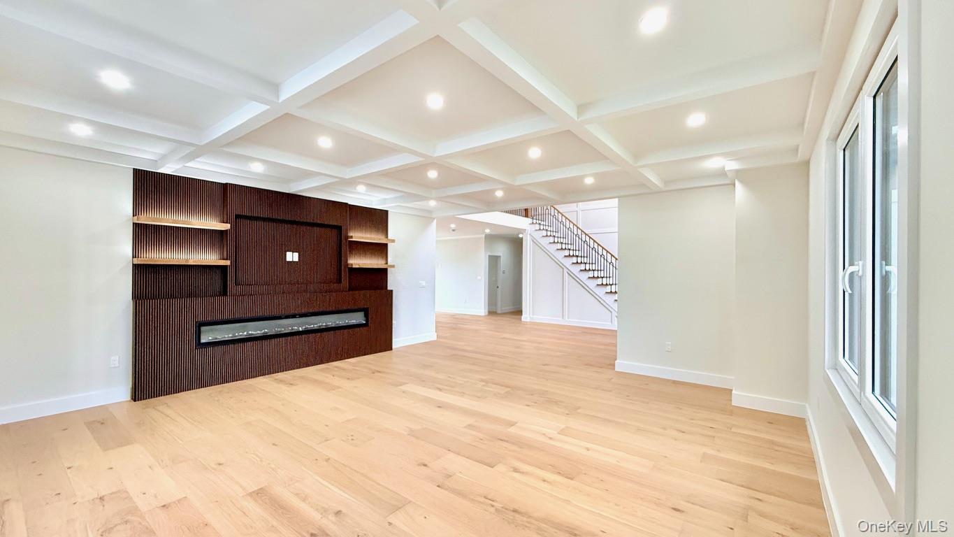 60 Periwinkle Road Levittown, NY 11756 - Photo 5 of 33 a view of an empty room and a windows