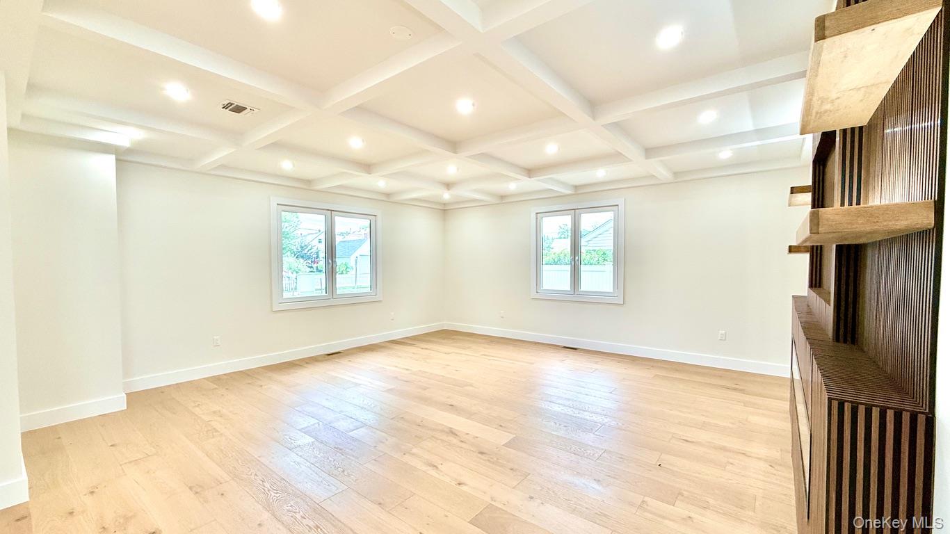 60 Periwinkle Road Levittown, NY 11756 - Photo 7 of 33 a view of an empty room and a window
