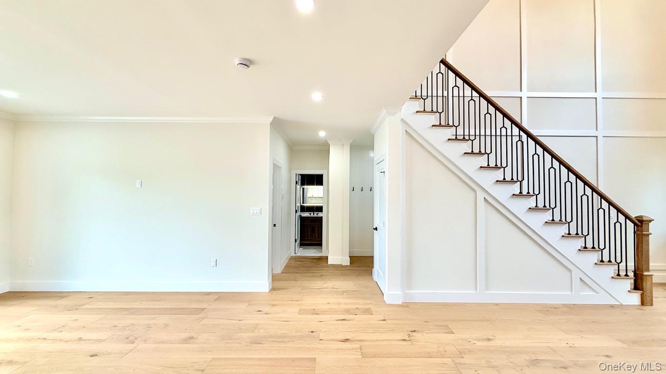 60 Periwinkle Road Levittown, NY 11756 - Photo 9 of 33 a view of entryway with wooden floor