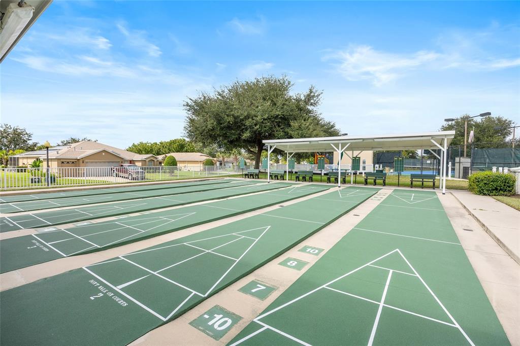 15092 Southwest 14th Avenue Road Ocala, FL 34473 - Photo 31 of 40 a view of a tennis ground with large trees