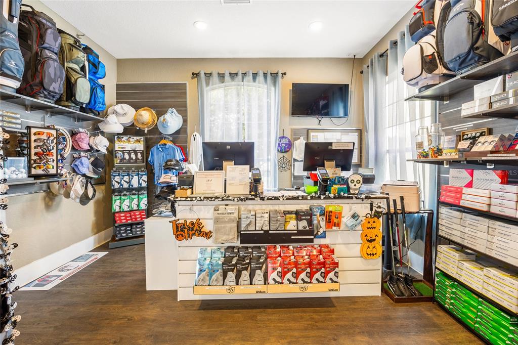 15092 Southwest 14th Avenue Road Ocala, FL 34473 - Photo 35 of 40 a living room with fireplace furniture and a flat screen tv