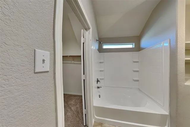 a bathroom with a bathtub