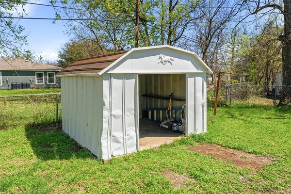 an aerial view of a house with a garden