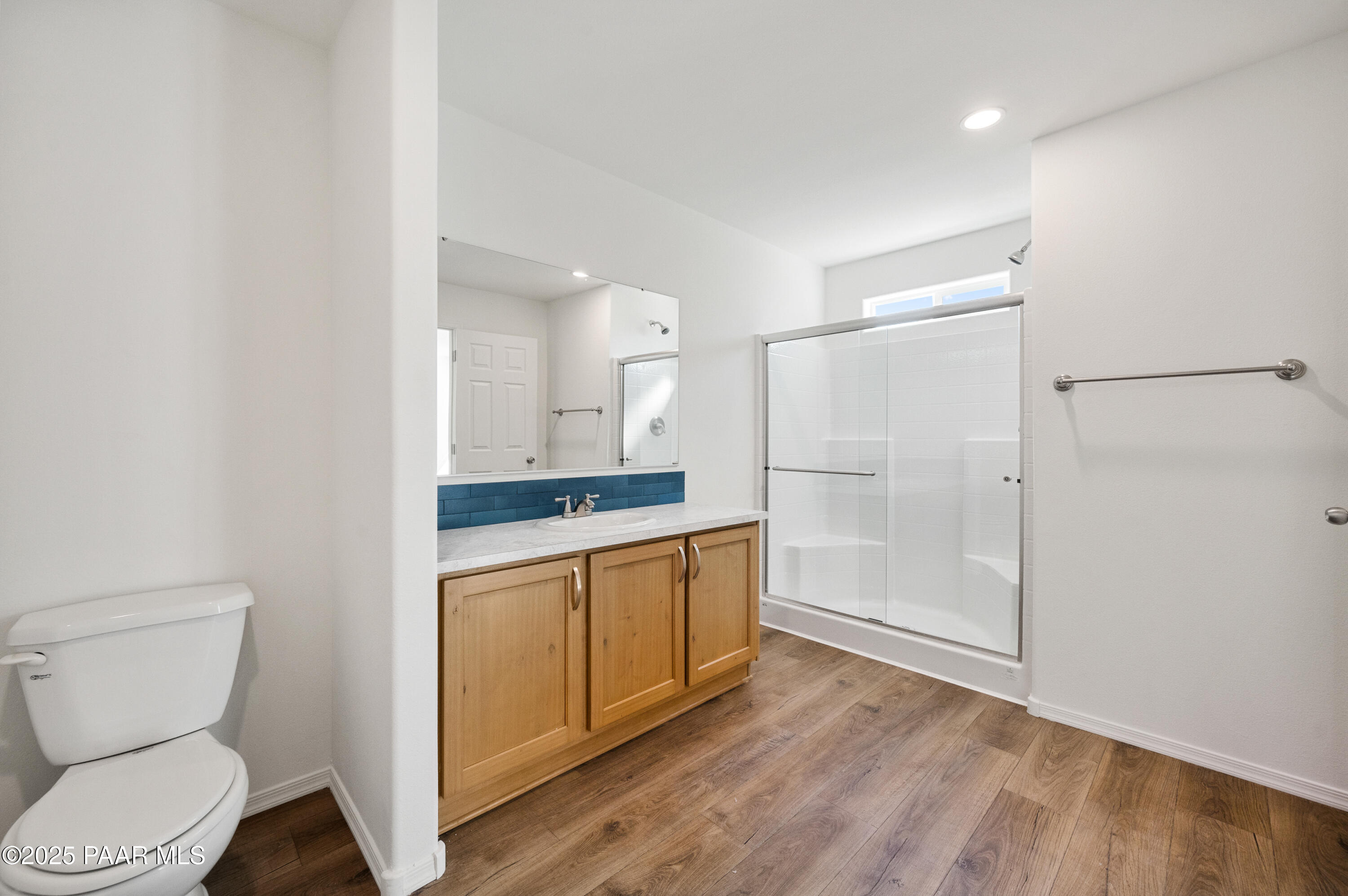 369 Granada Drive Paulden, AZ 86334 - Photo 20 of 37 a bathroom with a shower a toilet and a sink