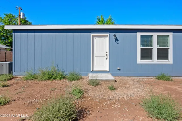 a view of a kitchen with a sink