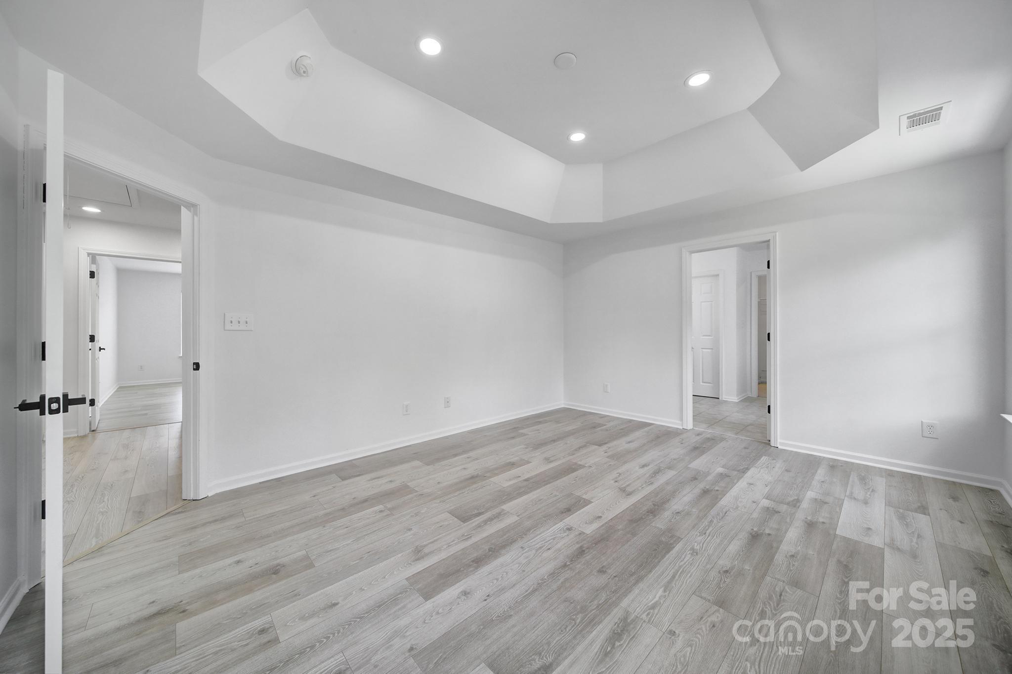 13425 Meadowmere Road Huntersville, NC 28078 - Photo 28 of 41 wooden floor in an empty room with a window
