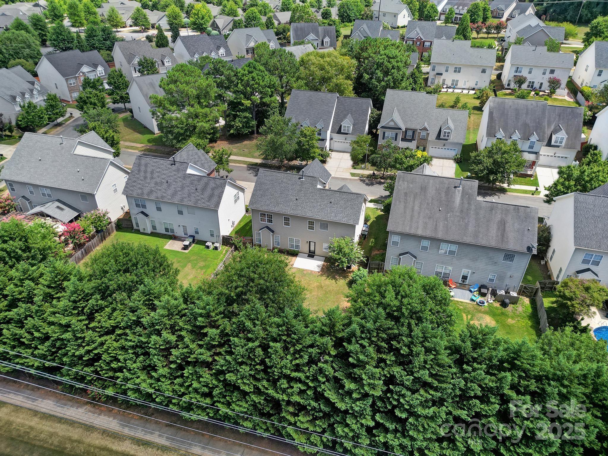 13425 Meadowmere Road Huntersville, NC 28078 - Photo 40 of 41 an aerial view of multiple houses with yard