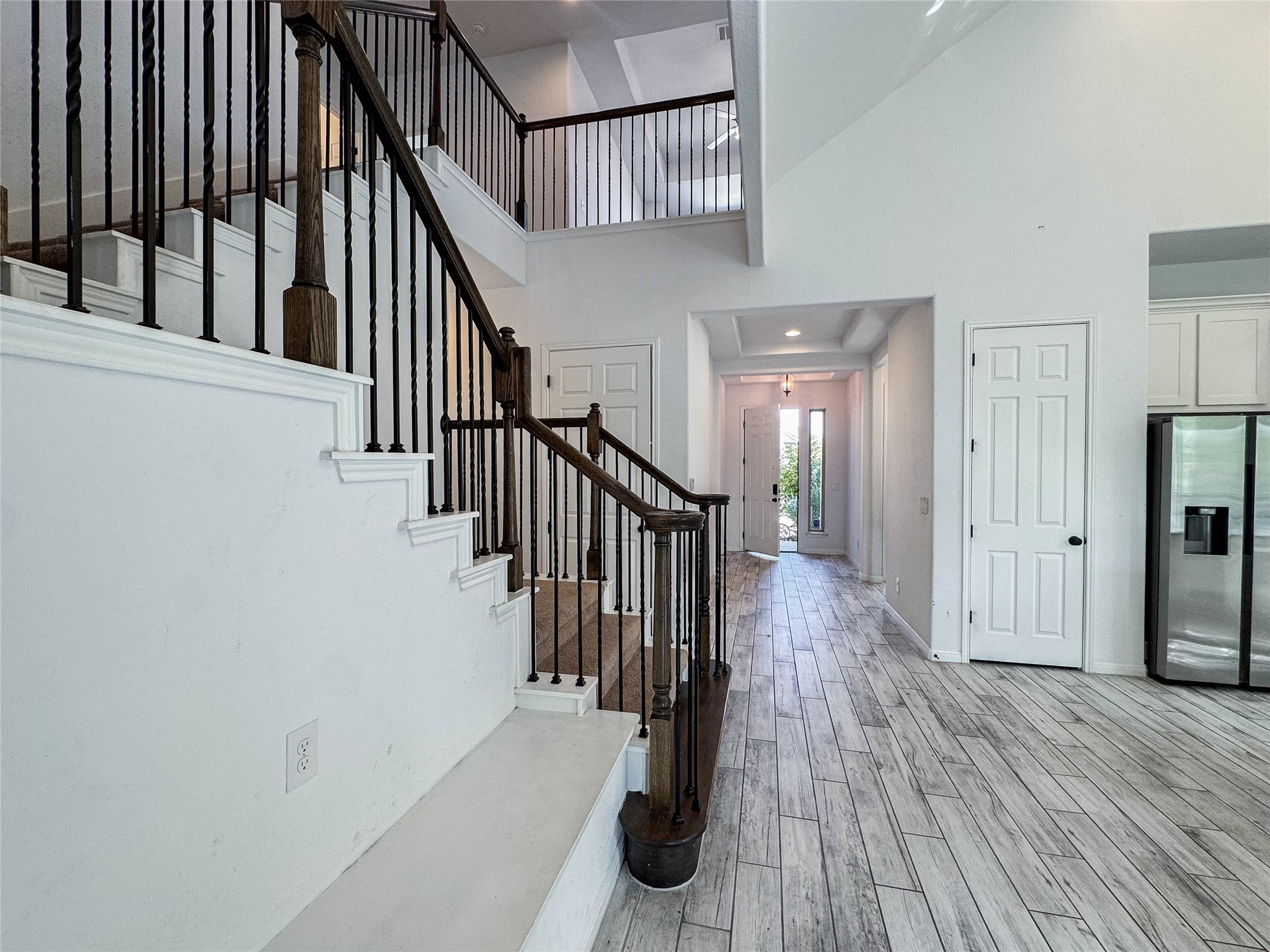 3810 Brushy Creek Road, Unit 73 Cedar Park, TX 78613 - Photo 15 of 42 a view of hallway with wooden floor and stairs