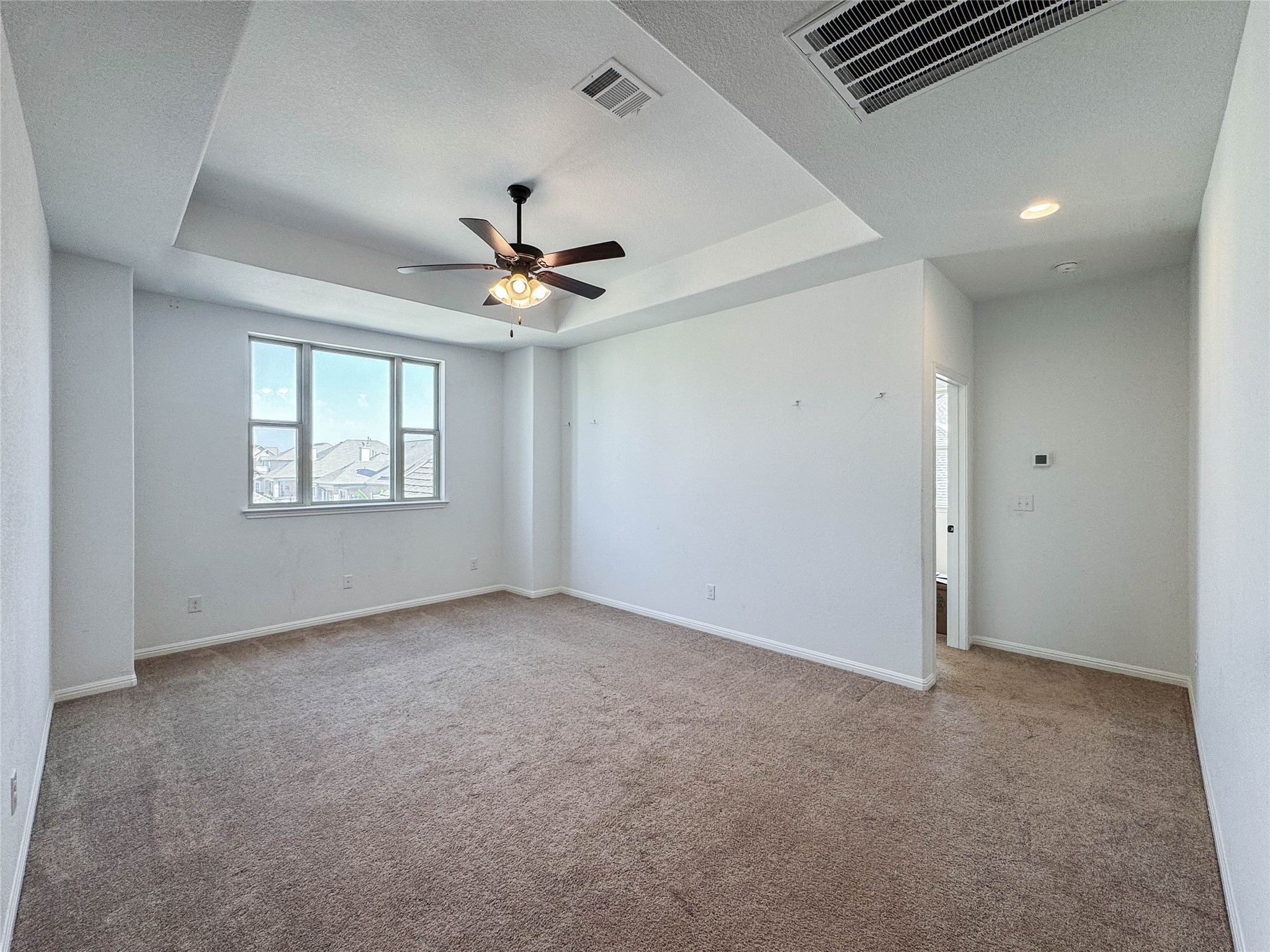 3810 Brushy Creek Road, Unit 73 Cedar Park, TX 78613 - Photo 24 of 42 an empty room with windows and fan