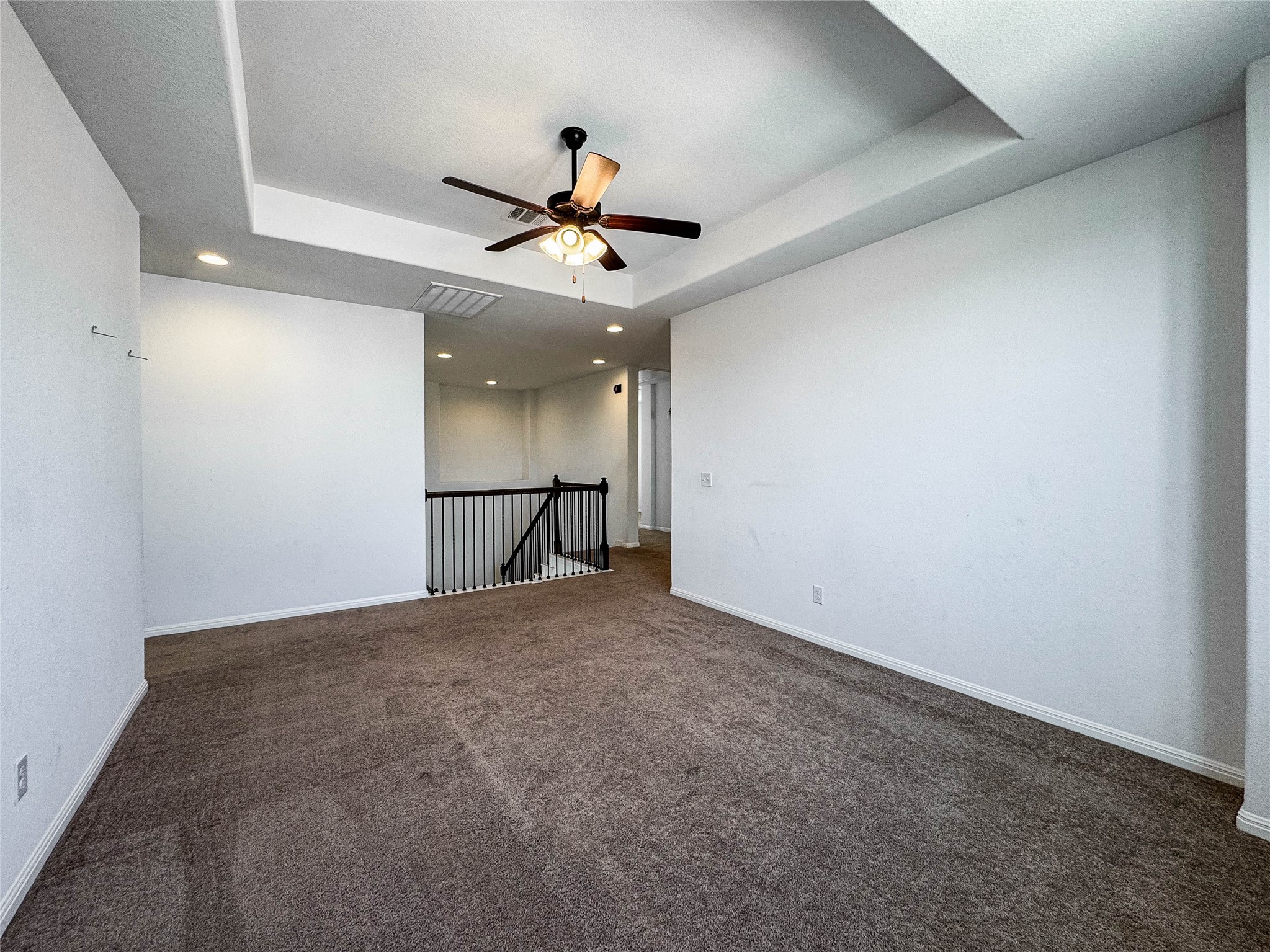 3810 Brushy Creek Road, Unit 73 Cedar Park, TX 78613 - Photo 25 of 42 an empty room with a light and a ceiling fan