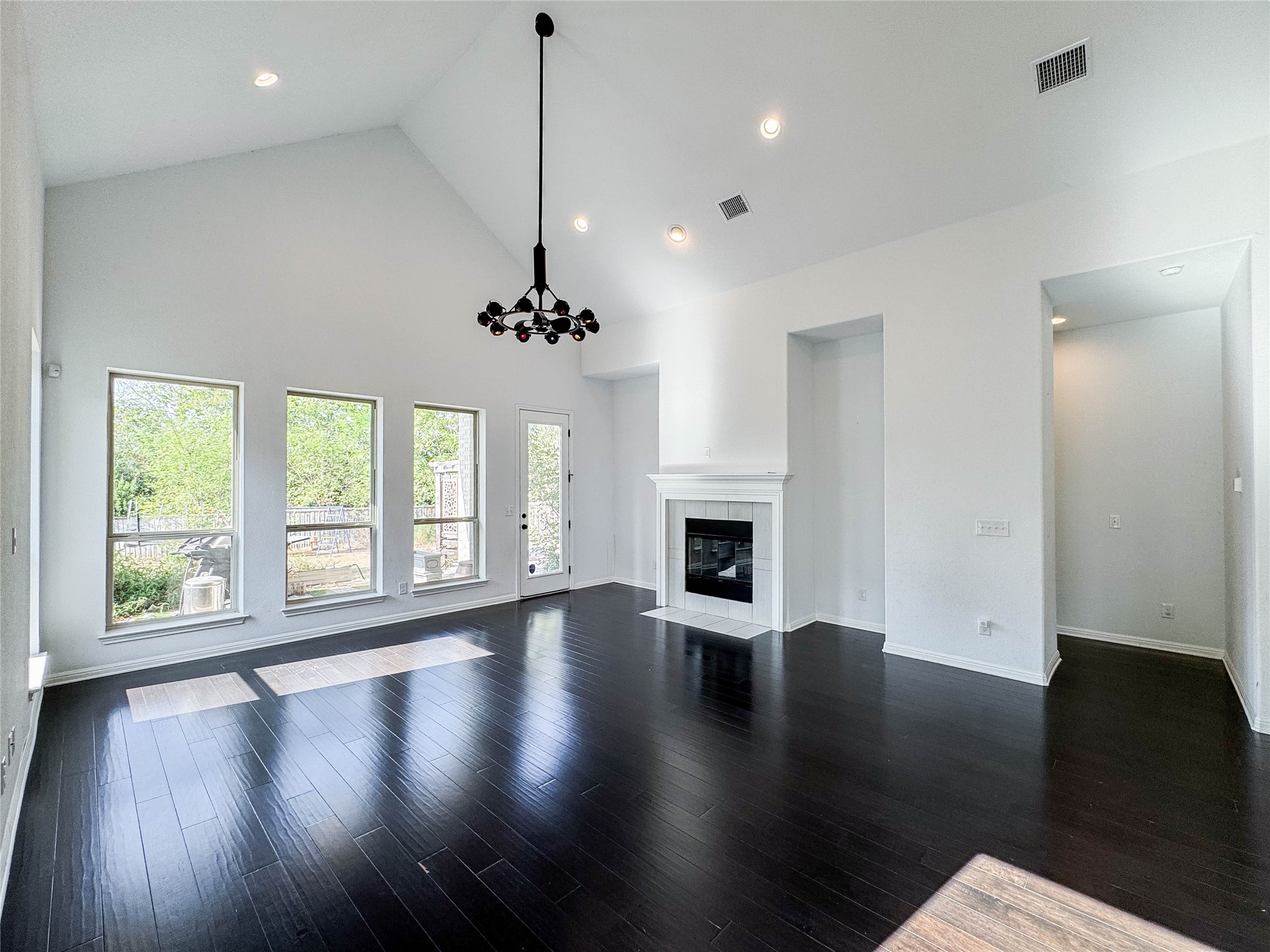 3810 Brushy Creek Road, Unit 73 Cedar Park, TX 78613 - Photo 31 of 42 a view of an empty room with wooden floor and a window