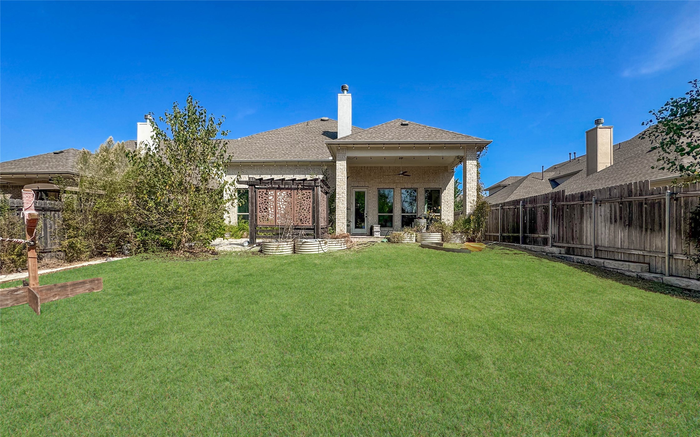 3810 Brushy Creek Road, Unit 73 Cedar Park, TX 78613 - Photo 38 of 42 a front view of a house with garden