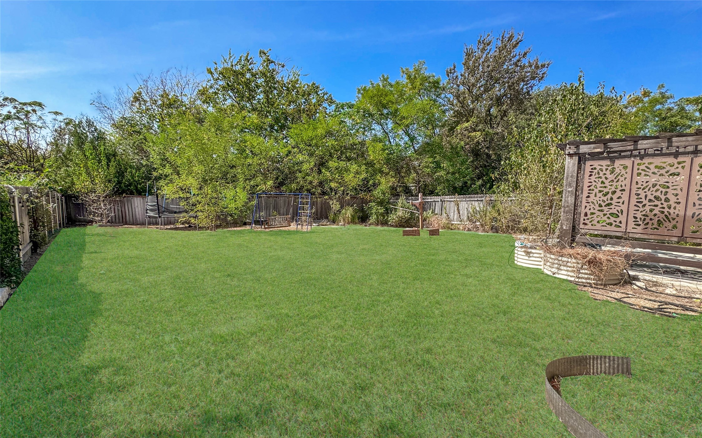 3810 Brushy Creek Road, Unit 73 Cedar Park, TX 78613 - Photo 39 of 42 a view of a backyard with a garden