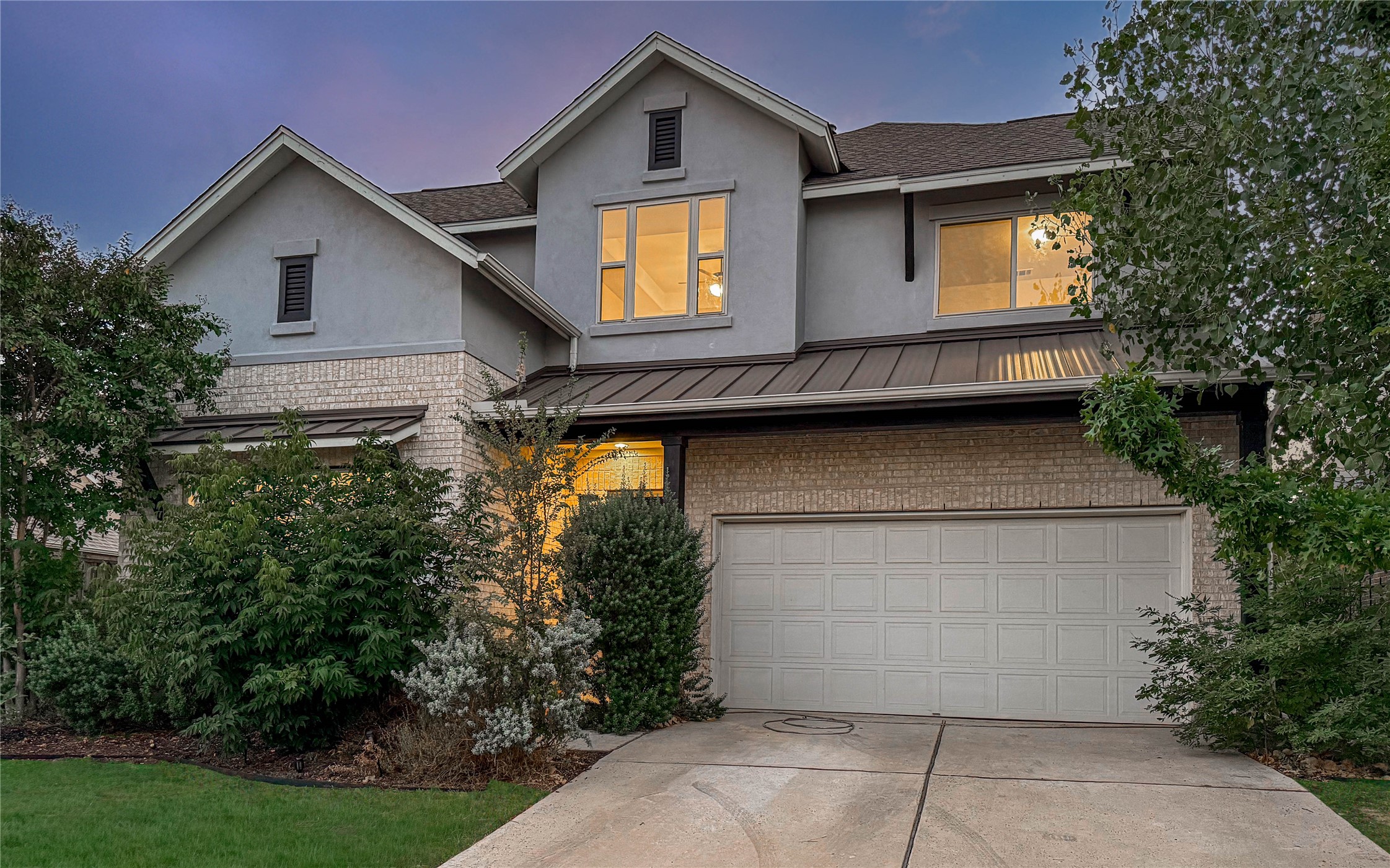 3810 Brushy Creek Road, Unit 73 Cedar Park, TX 78613 - Photo 42 of 42 a front view of a house with garden