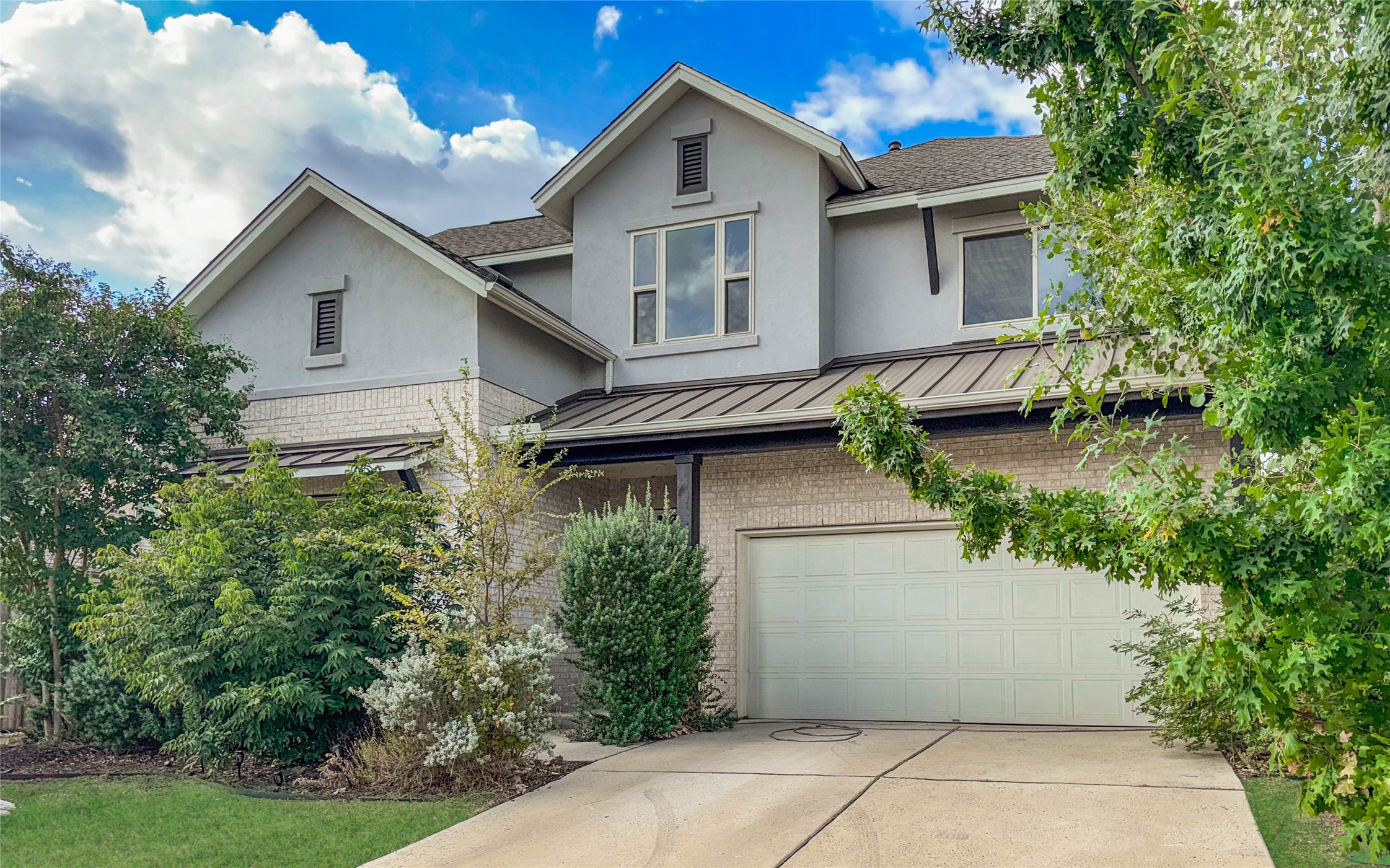 3810 Brushy Creek Road, Unit 73 Cedar Park, TX 78613 - Photo 6 of 42 a view of a house with a yard and plants