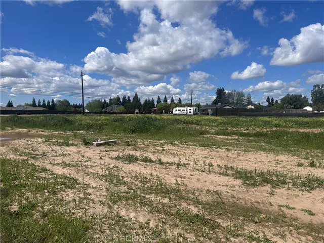 a view of a golf course with a lake