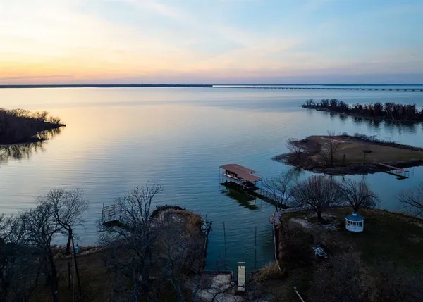 a view of a lake from a yard