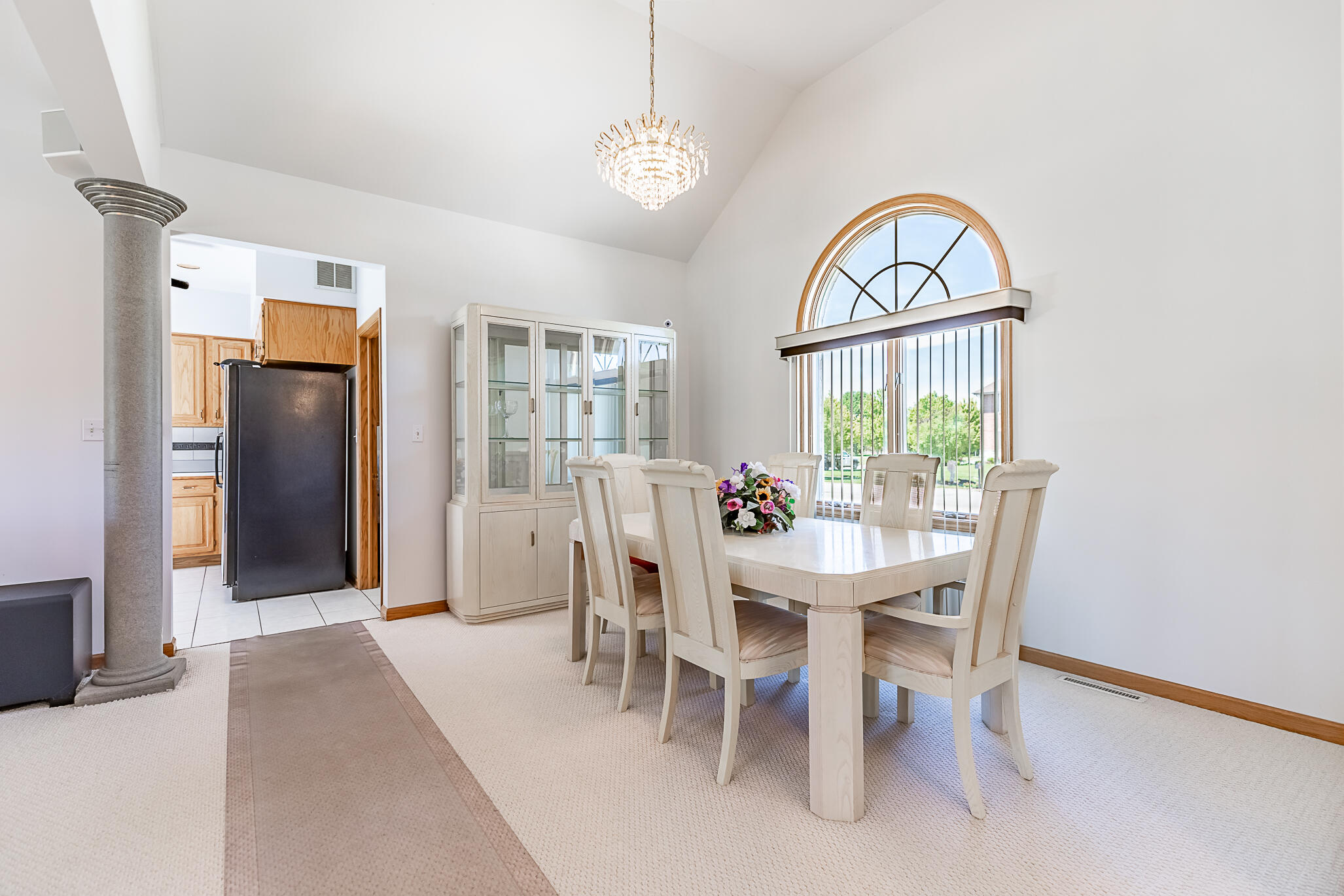 1020 Cornwallis Lane Munster, IN 46321 - Photo 15 of 41 a view of a dining room with furniture window and wooden floor