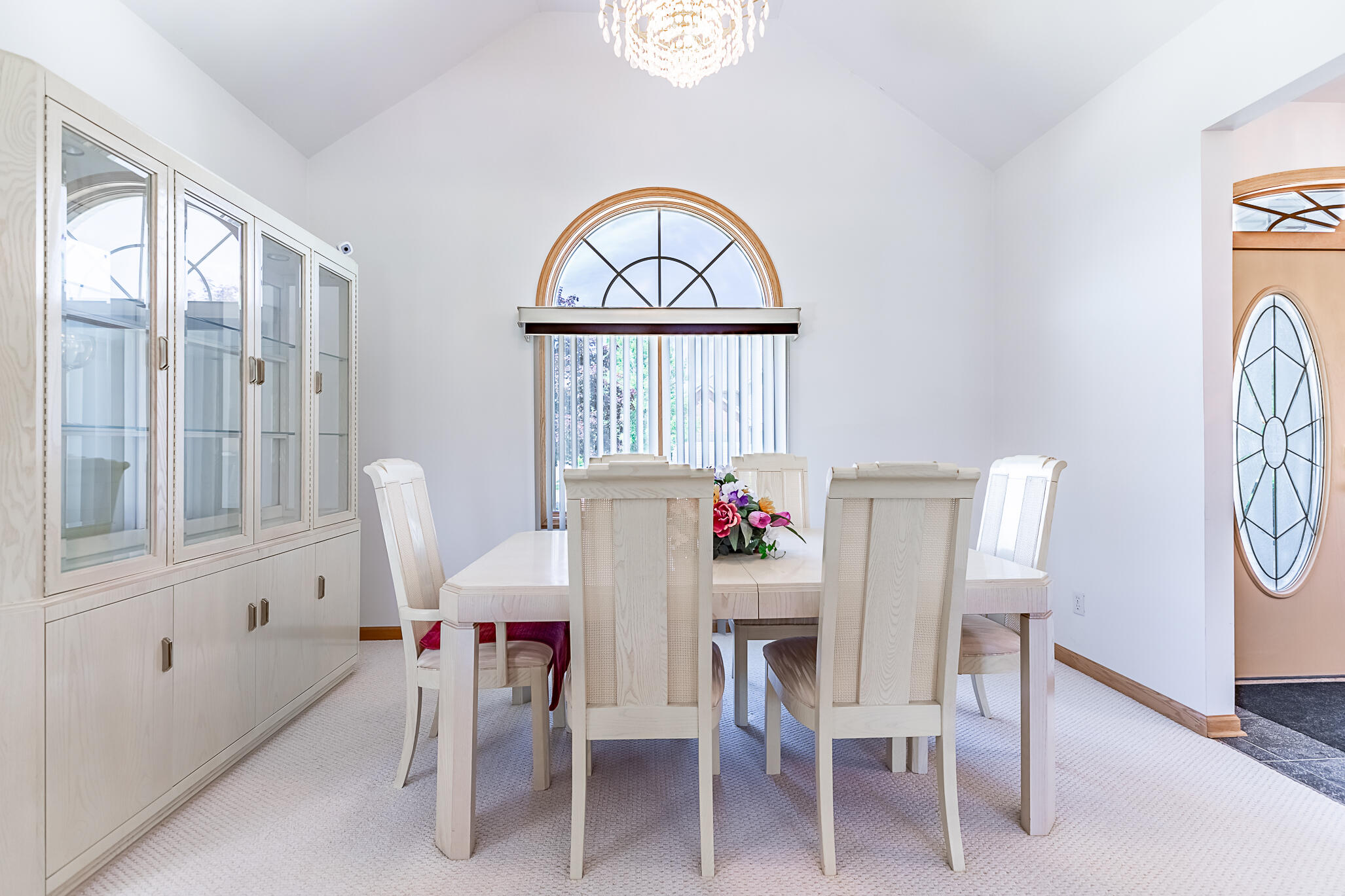 1020 Cornwallis Lane Munster, IN 46321 - Photo 16 of 41 a dining room with furniture a rug and a window