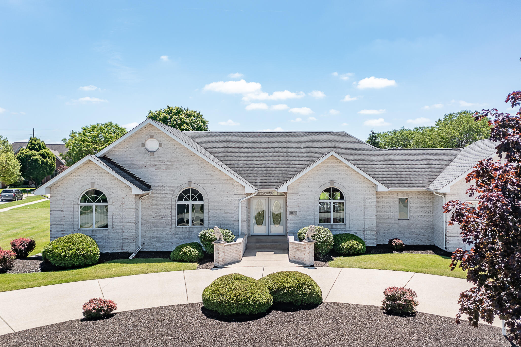 1020 Cornwallis Lane Munster, IN 46321 - Photo 3 of 41 a front view of a house with garden