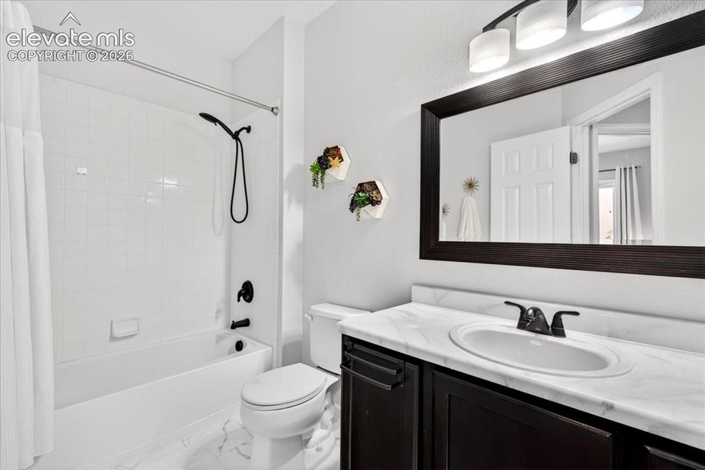 12113 Point Reyes Drive Peyton, CO 80831 - Photo 17 of 34 Upstairs Guest Bathroom