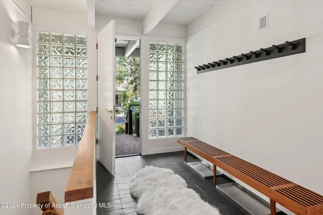 a room with window and stairs