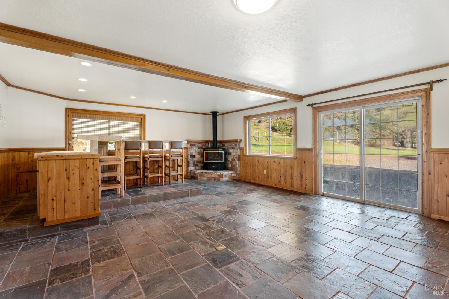 4595-4601 Feliz Creek Road Hopland, CA 95449 - Photo 23 of 74 Bar area and fireplace in main house