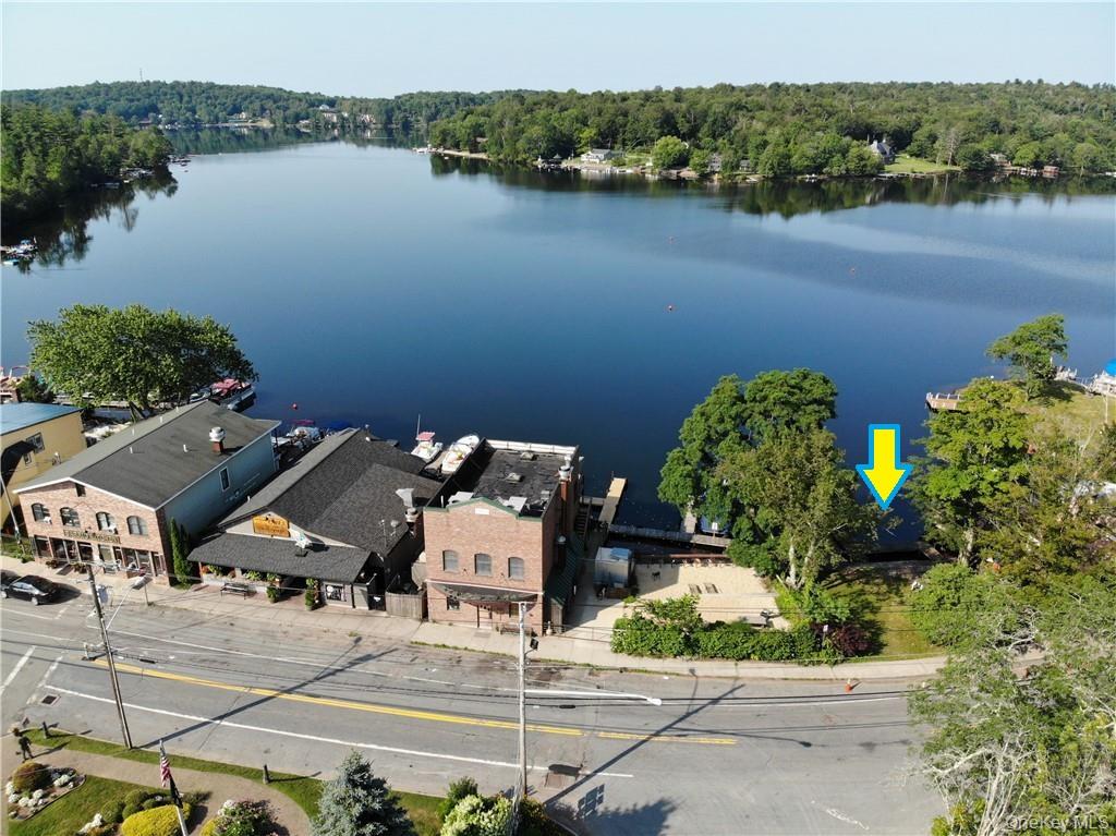 Lot 18 Horseshoe Lake Road Kauneonga Lake, NY 12749 - Photo 24 of 24 an aerial view of a house with garden space and lake view