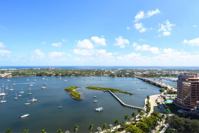 a living room with lots of furniture and a flat screen tv