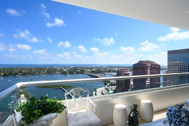 a bedroom with a bed window and a television