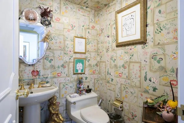 a view of a swimming pool with a bench and a porch