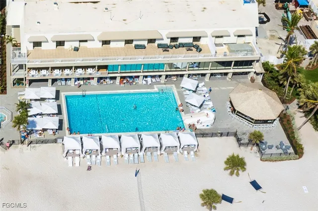 an aerial view of a house with a garden