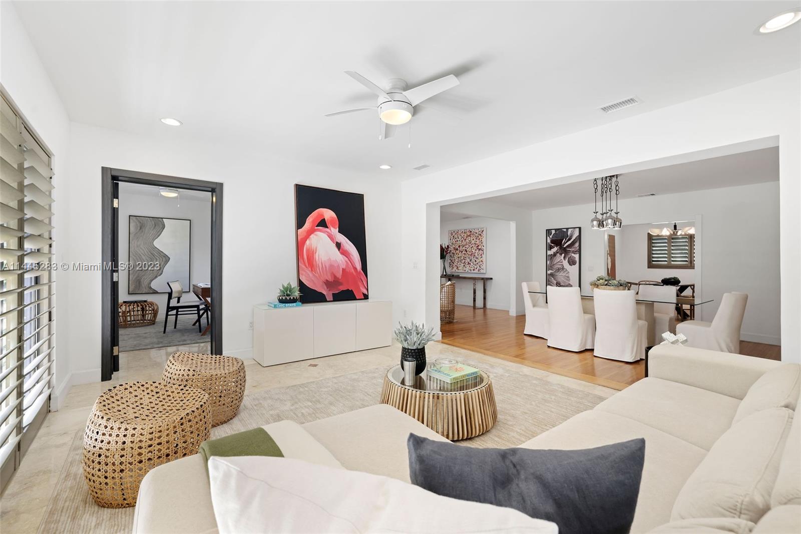3411 Riviera Drive Coral Gables, FL 33134 - Photo 12 of 38 a living room with furniture and kitchen view