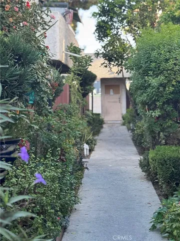 a front view of a house with yard