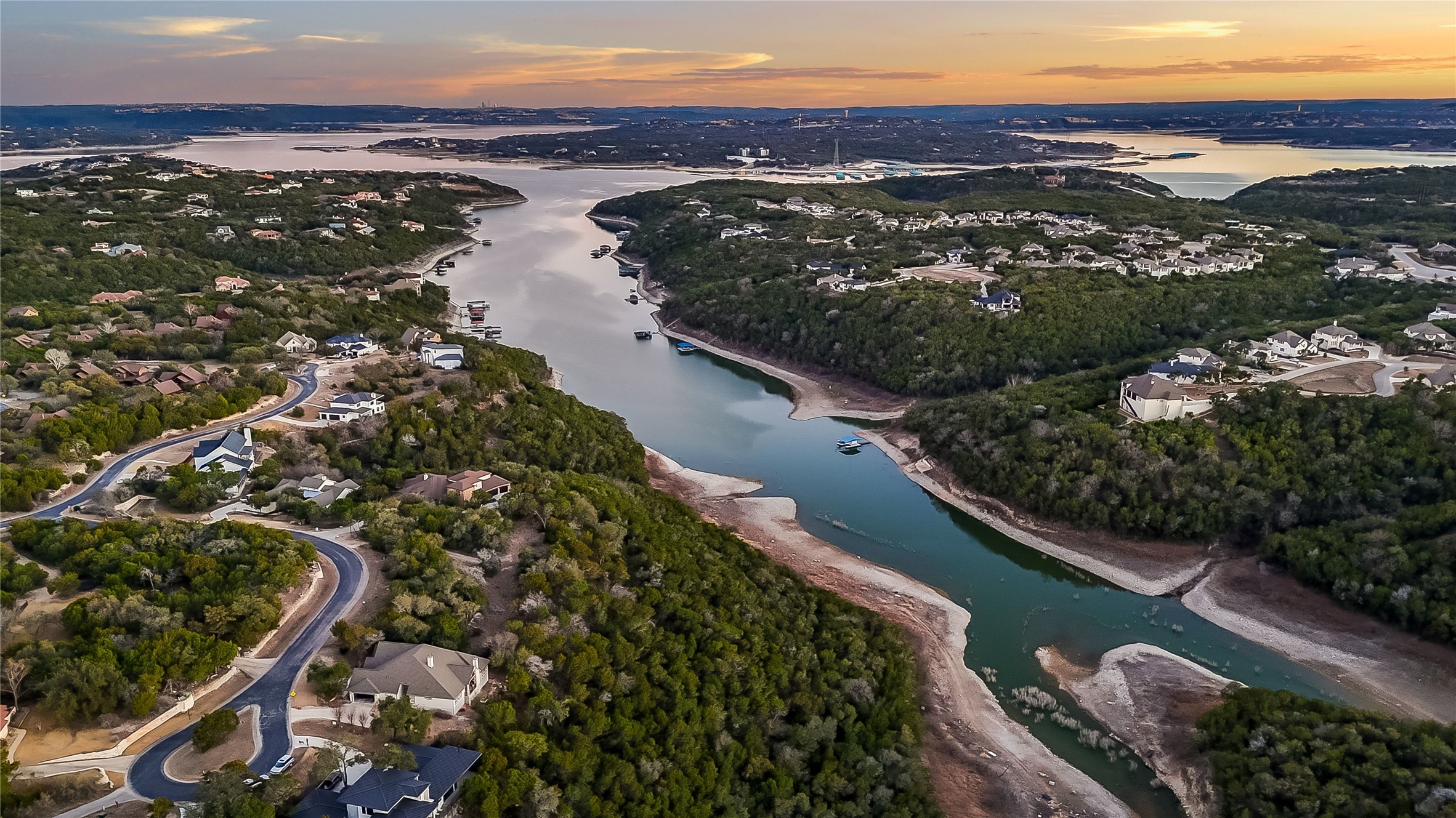 18333 Hidden Ridge Place Lago Vista, TX 78645 - Photo 19 of 40 Aerial view of Devil's Cove with The Hollows on both sides and main body Lake Travis in the background.