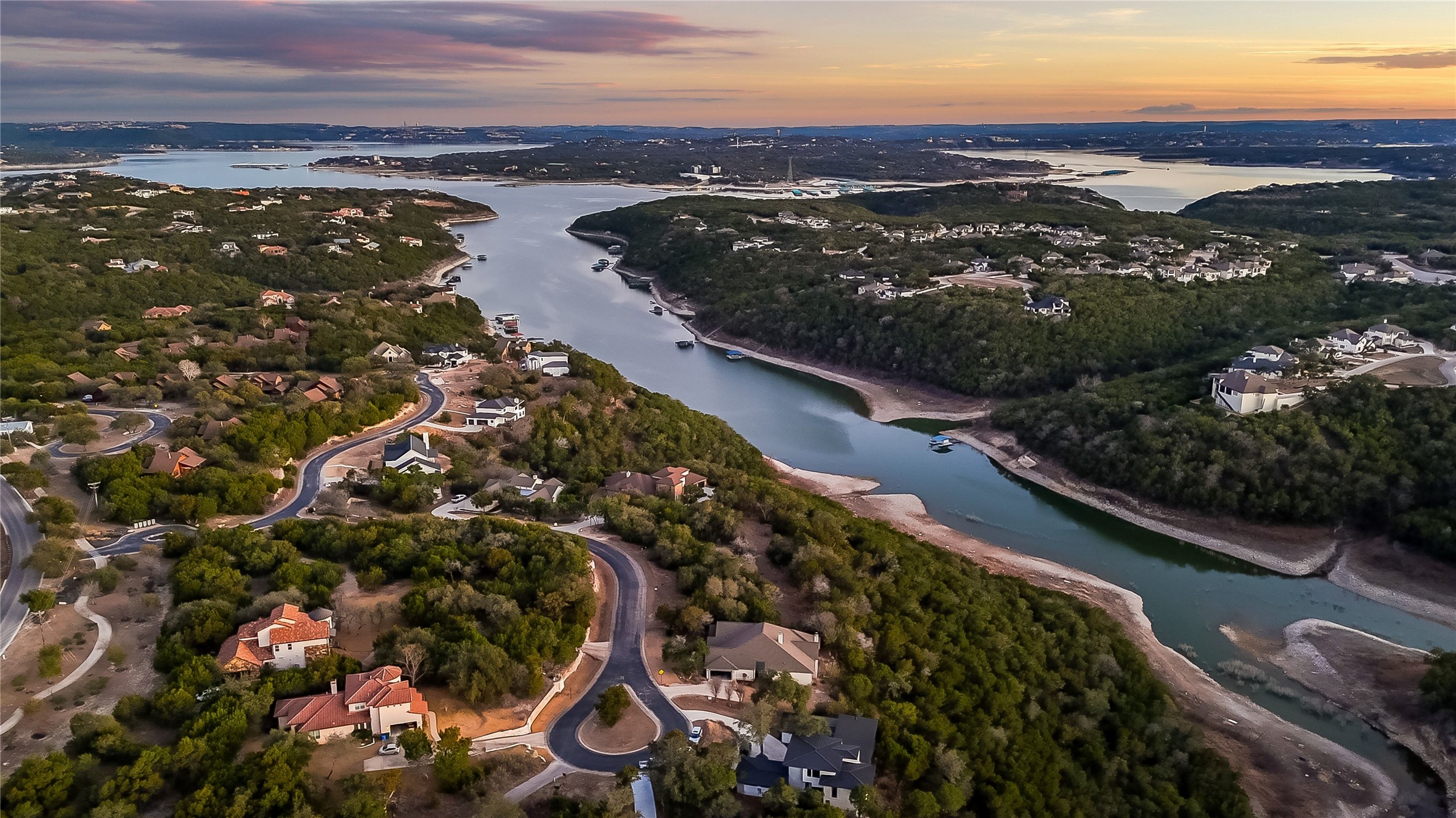 18333 Hidden Ridge Place Lago Vista, TX 78645 - Photo 6 of 40 Aerial view of Devil's Cove with The Hollows on both sides and main body Lake Travis in the background.