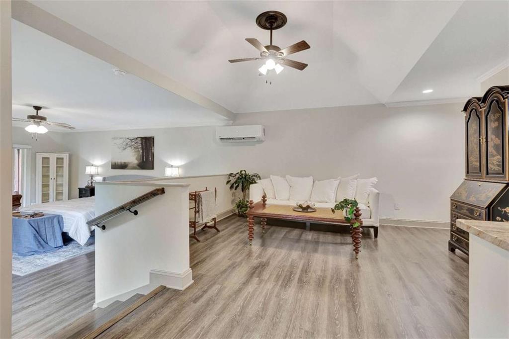 4 Northlake Circle Peachtree City, GA 30269 - Photo 14 of 33 a living room with furniture and wooden floor