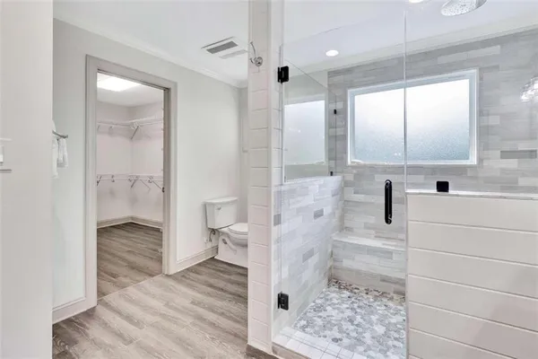 a bathroom with a sink and a shower