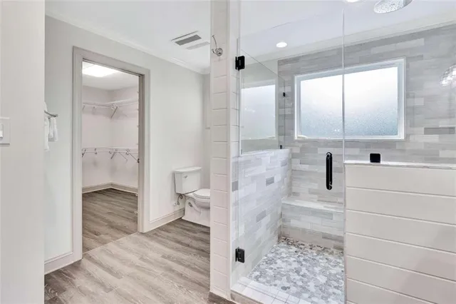 a bathroom with a sink and a shower