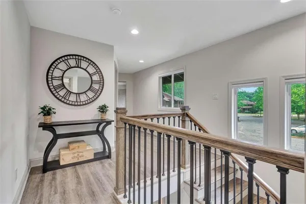 a view of a room with furniture wooden floor and window