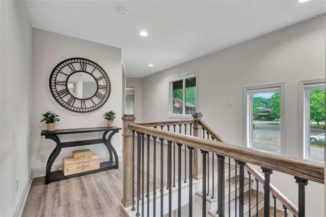 a view of a room with furniture wooden floor and window