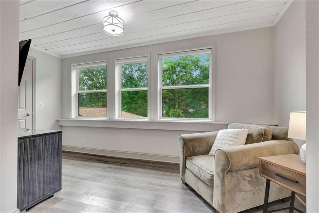4 Northlake Circle Peachtree City, GA 30269 - Photo 23 of 33 a living room with furniture and a window