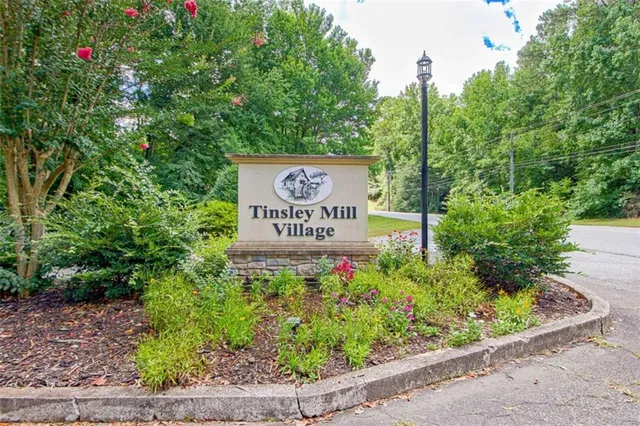 a sign on the side of the road