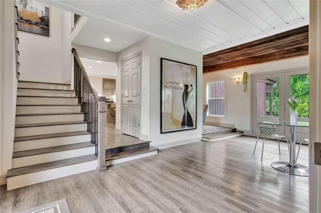 4 Northlake Circle Peachtree City, GA 30269 - Photo 6 of 33 a view of an entryway with wooden floor and door
